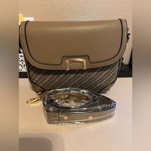 NWOT: Boutique vegan leather purse with detachable cross body strap.